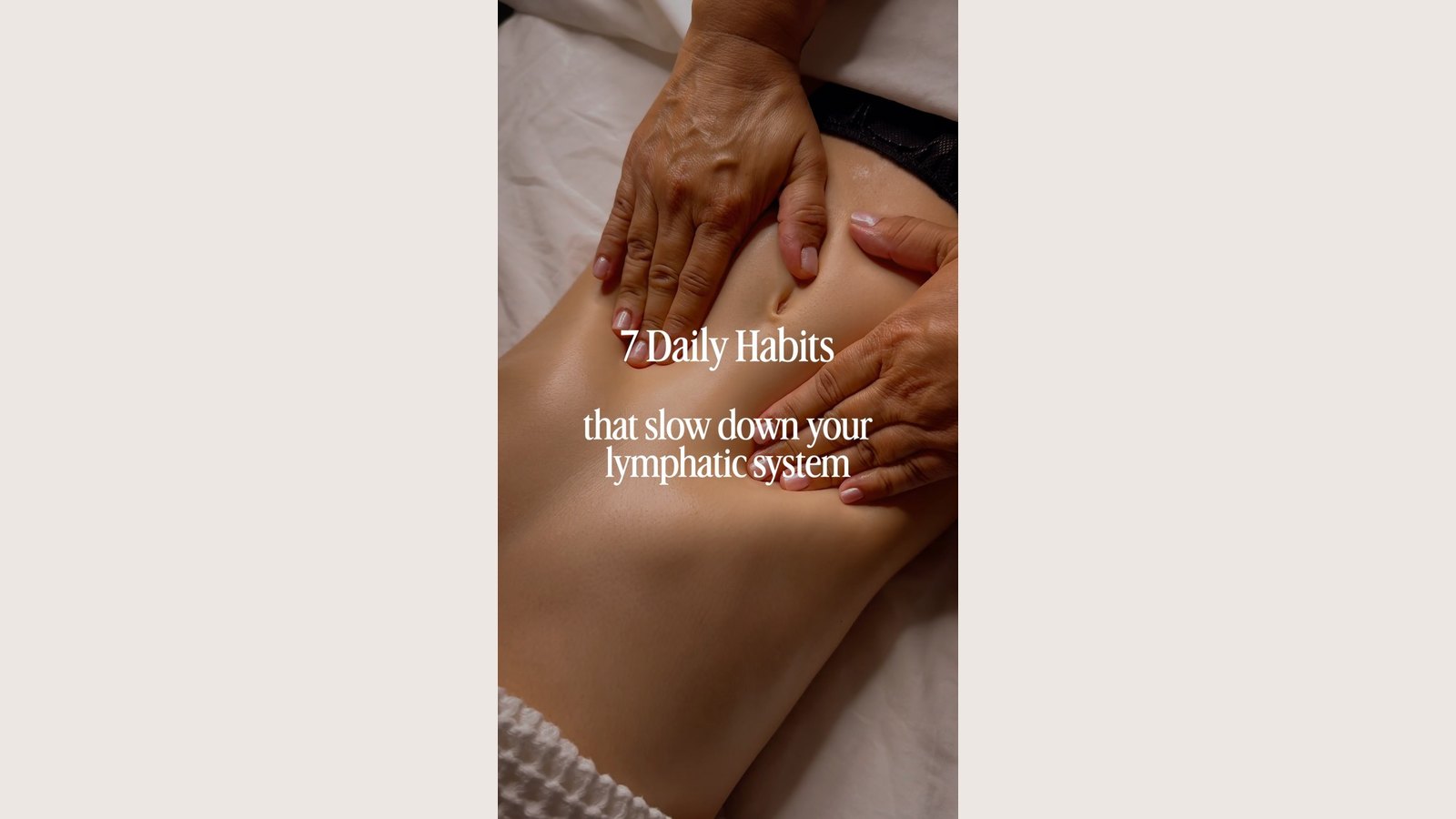 Cover frame of the reel: a therapist's hands making light strokes across a client's draped abdomen in the Lymphyx studio, Beverly Hills